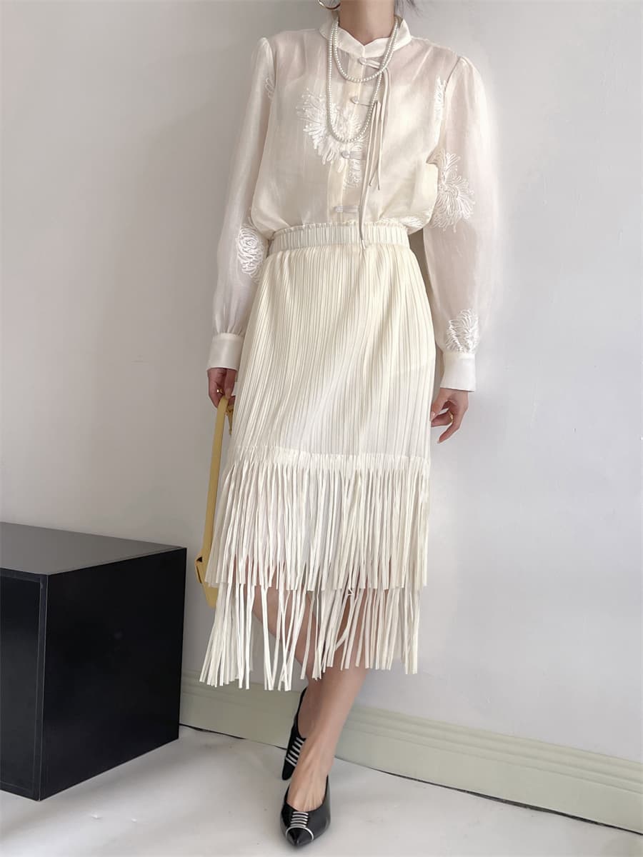 白スカート 流れるフリンジプリーツスカート