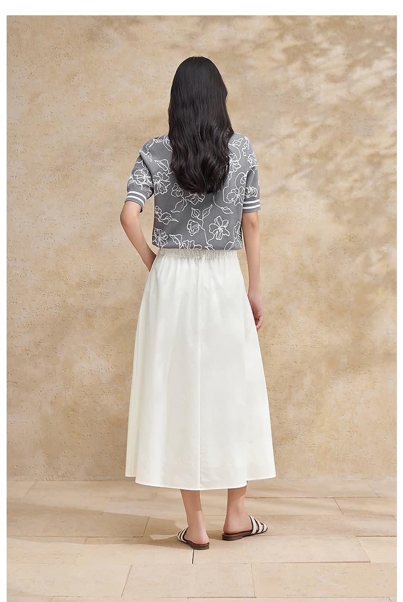 白スカート プリーツ入りミモレ丈フレアスカート