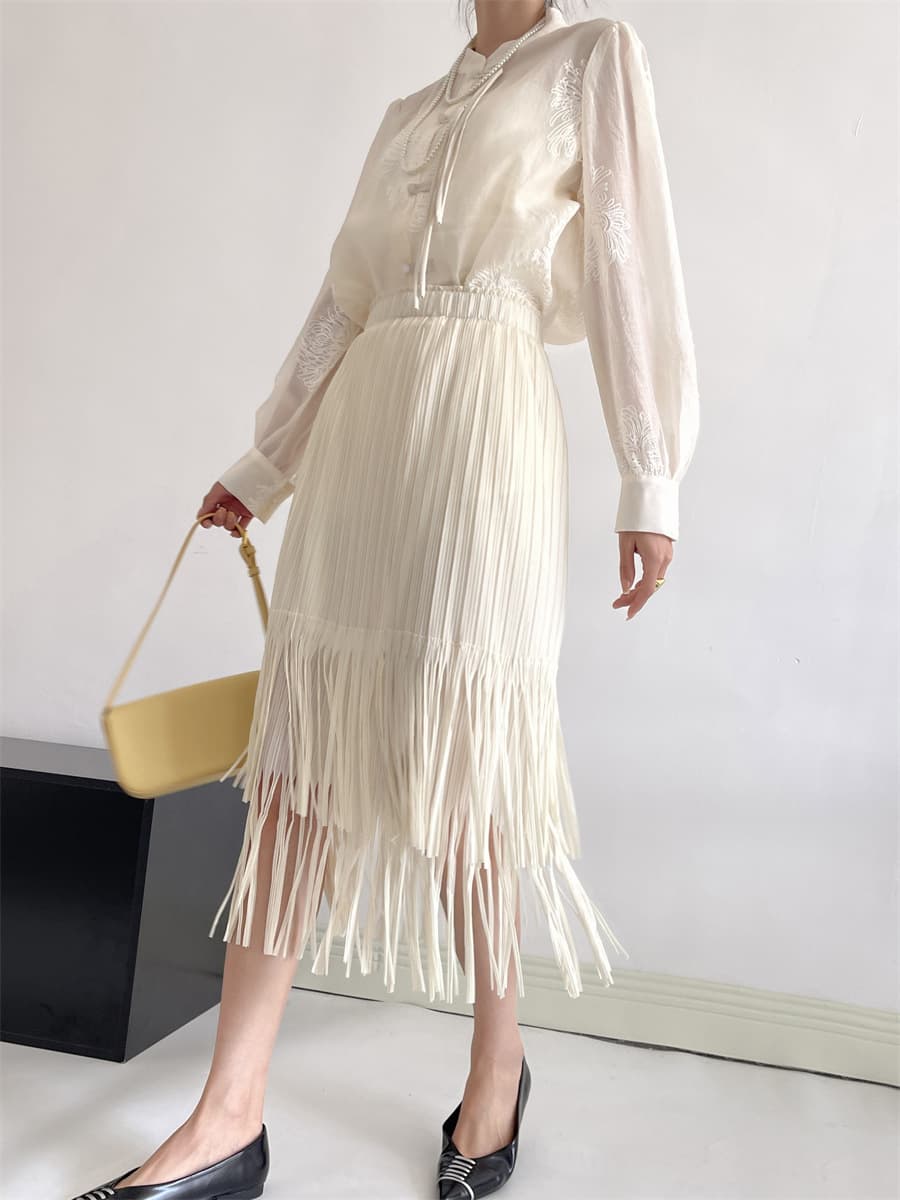 白スカート 流れるフリンジプリーツスカート