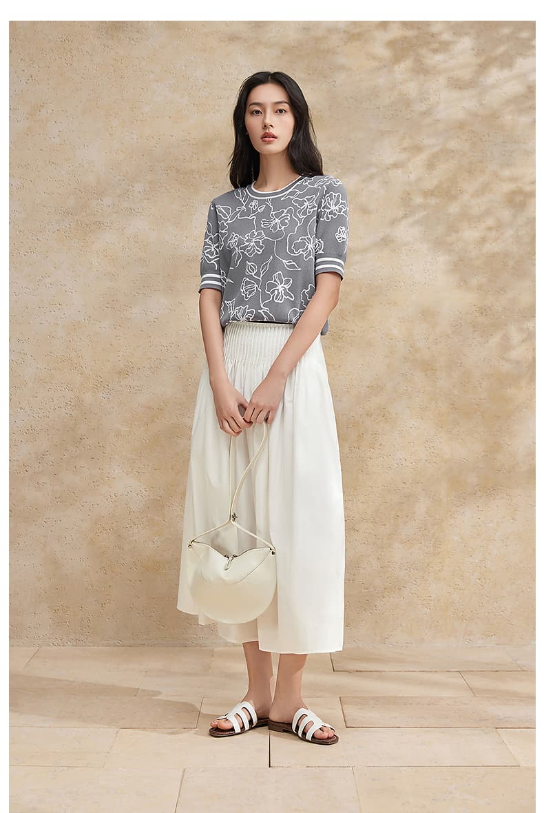 白スカート プリーツ入りミモレ丈フレアスカート