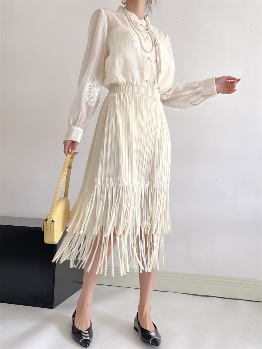 白スカート 流れるフリンジプリーツスカート