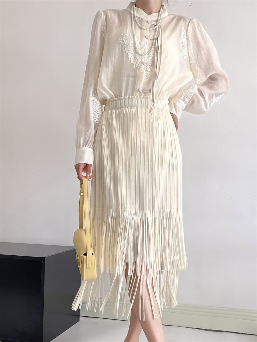 白スカート 流れるフリンジプリーツスカート