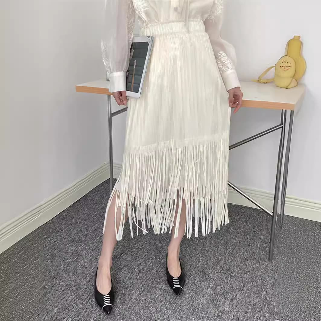 白スカート 流れるフリンジプリーツスカート