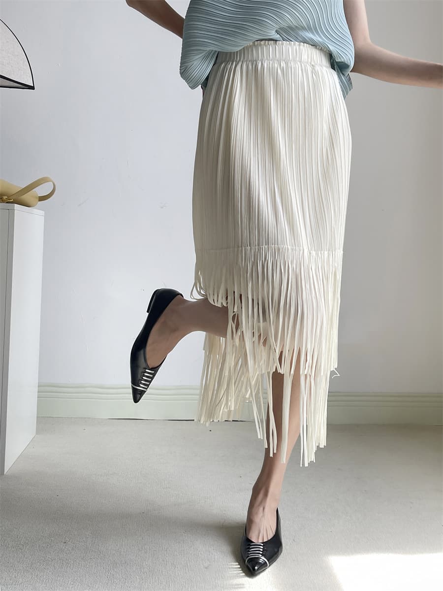 白スカート 流れるフリンジプリーツスカート