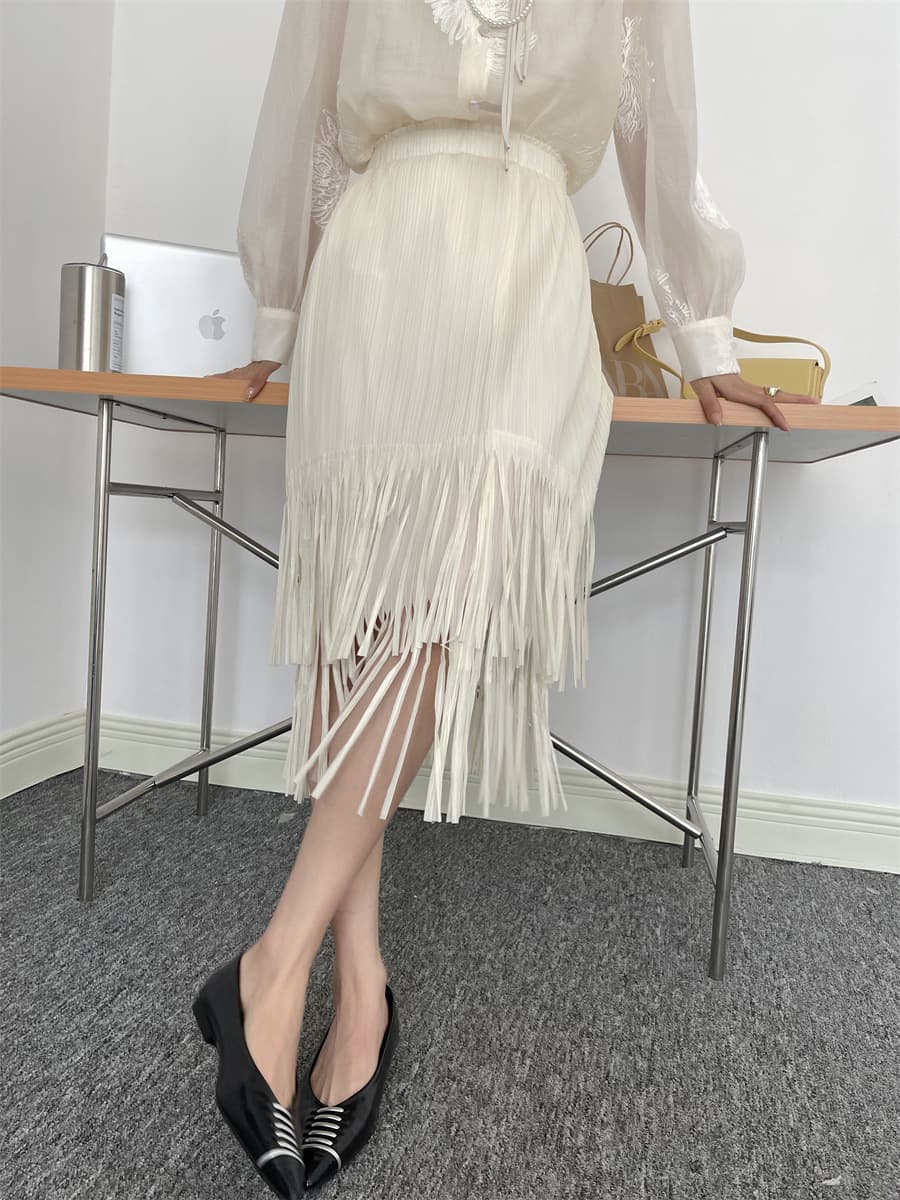 白スカート 流れるフリンジプリーツスカート