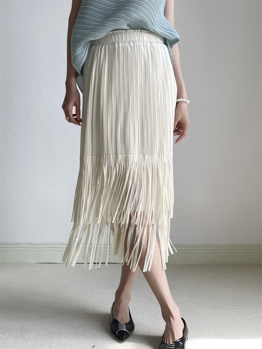 白スカート 流れるフリンジプリーツスカート