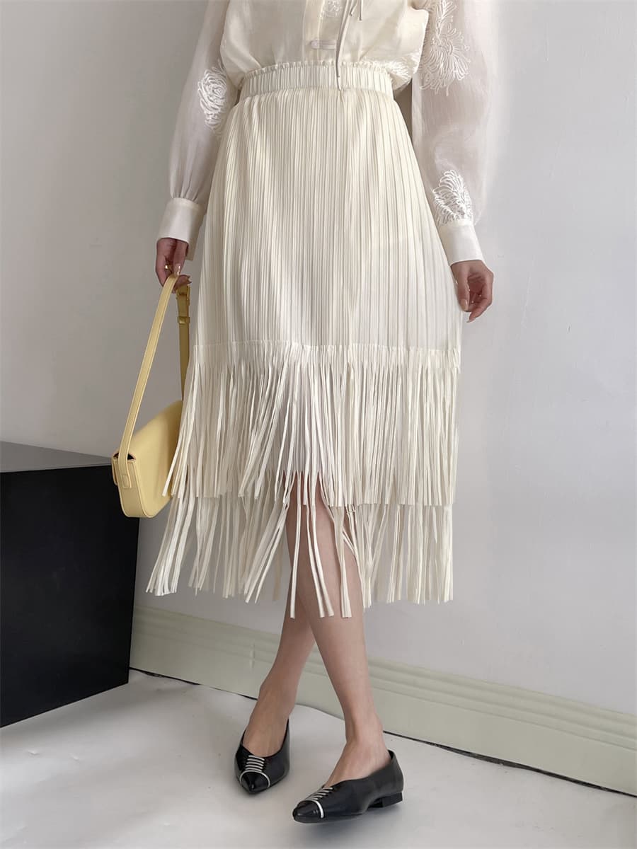 白スカート 流れるフリンジプリーツスカート
