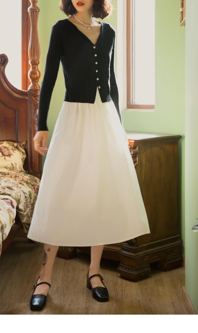 白スカート 優美なミディ丈プリーツスカート