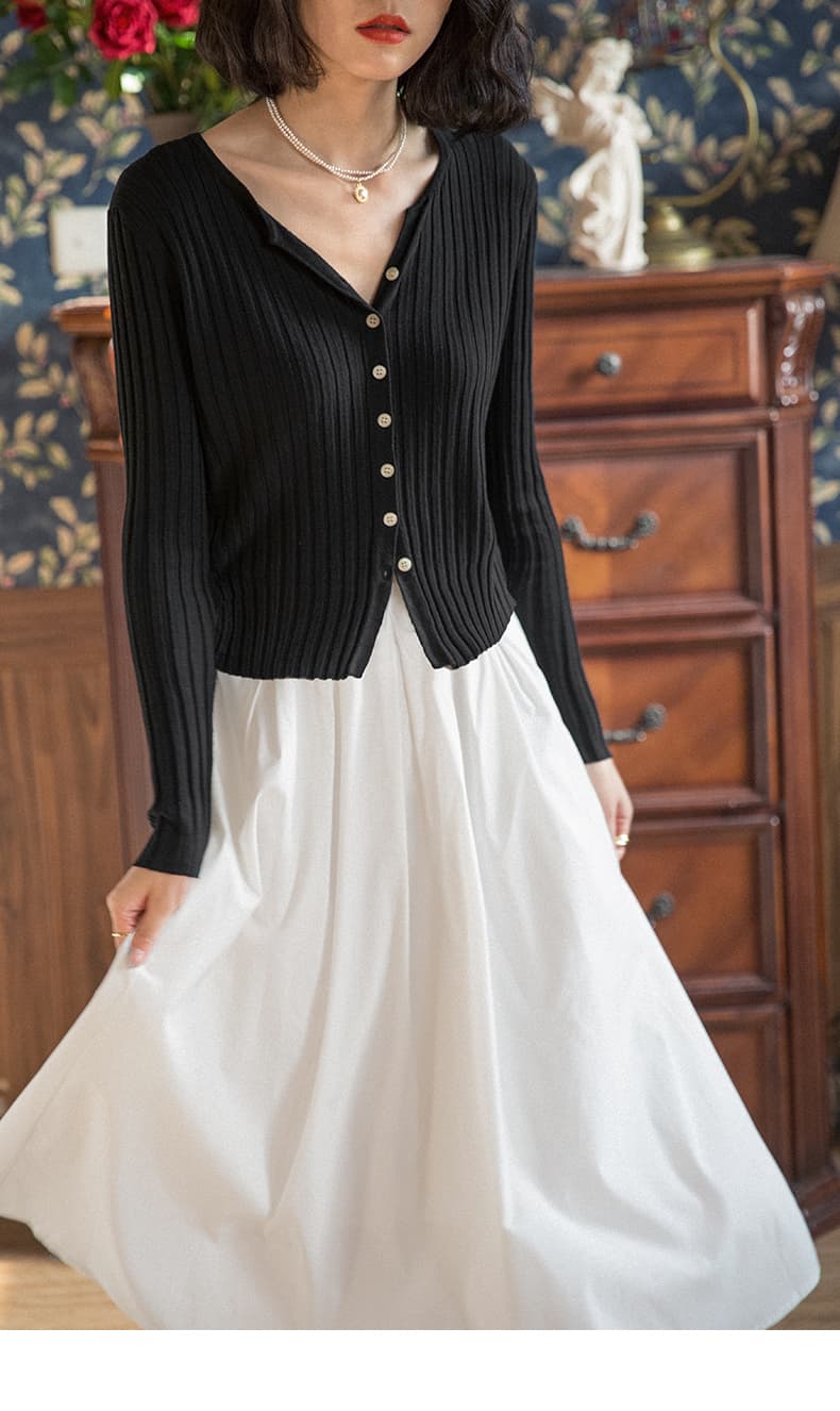 白スカート 優美なミディ丈プリーツスカート