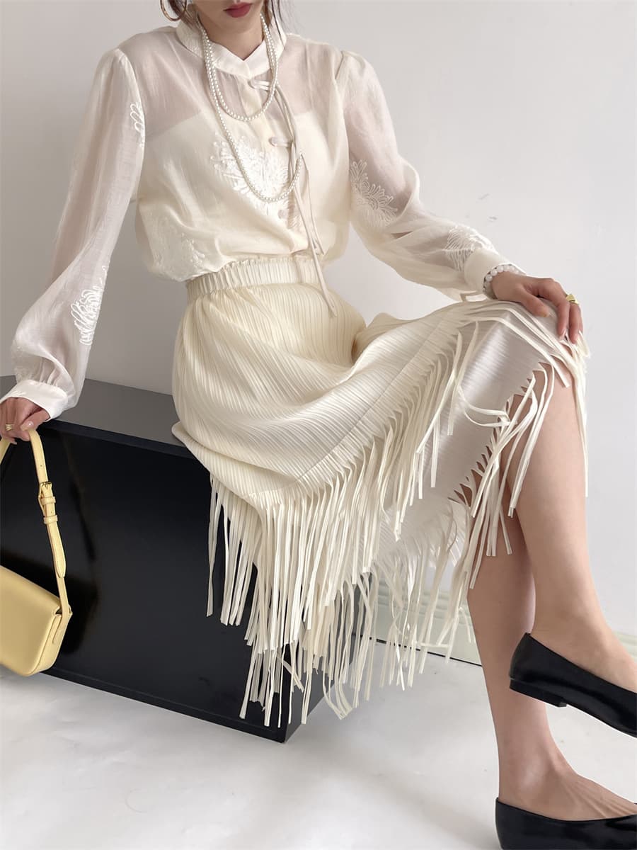 白スカート 流れるフリンジプリーツスカート