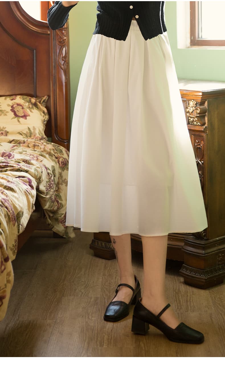 白スカート 優美なミディ丈プリーツスカート