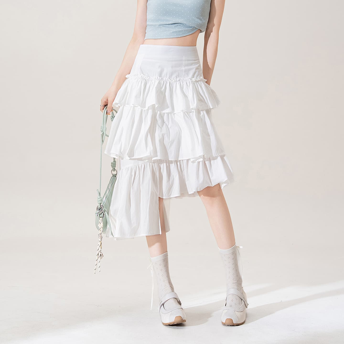 白スカート 三段フリル非対称プリーツスカート